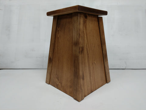 A wooden gun concealment lamp with a dark brown wood stain. 