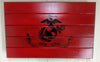 United States Marine Corps gun concealment flag with 5 red panels & a black stenciled Marine Corps logo.