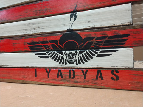An American gun concealment flag with the IYAOYAS logo painted in black.