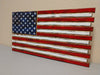Mini American flag gun concealment case with bright red, white, and blue colors and slightly longer red stripes.
