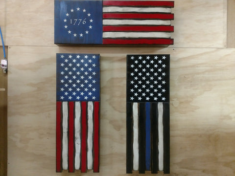 3 half sized U.S flag gun concealment cases. 1 colonial style with 13 stars, 1 classic U.S flag, & 1 black & white with a blue stripe