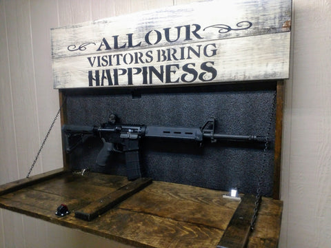 LARGE “VISITORS BRING HAPPINESS” GUN CONCEALMENT WALL ART