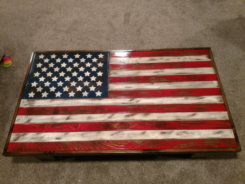 Looking down on a gun concealment coffee table with an American flag sliding top.