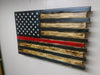 American flag gun concealment case with black and natural wood colored stripes and a one thin red stripe under the stars