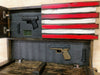 Opened gun concealment flag with a pistol & military patch in the top left and a pistol & ammo clip on bottom