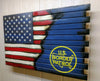 A large gun concealment case with a US flag converts into a blue background with a large yellow stenciled US border patrol logo