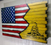 A large gun concealment case with a US flag transitions criss-cross into yellow background with a large black stenciled Gadsden design