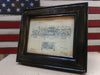 An 8x10 distressed black gun concealment picture frame with a diagram of an old, vintage car from 1912 inside. 