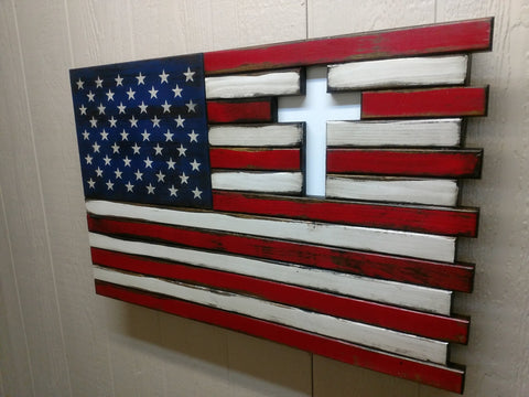American flag gun concealment case with altering length red & white stripes and a white cross cut out of the upper right