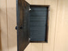 Grey interior of a dark hanging mini wooden wall box empty of weapons.