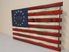 2 compartment, 1776 American flag gun concealment case with red & white stripes, 13 stars in a circle and 1776 written in the middle