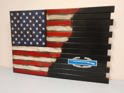 Gun concealment case with a partial American flag on left blended into a black background with military infantry logo on right