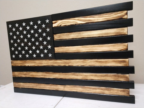 U.S gun concealmet flag with black colored and natural wood stripes with the black stripes slightly longer than the wood