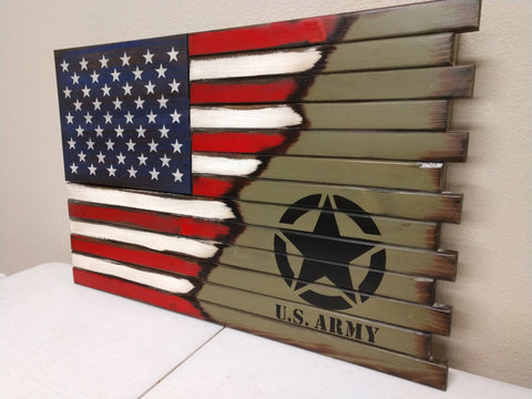 A large American concealment flag transitions into a green background with black stenciling of a US army logo that has a star inside of a circle